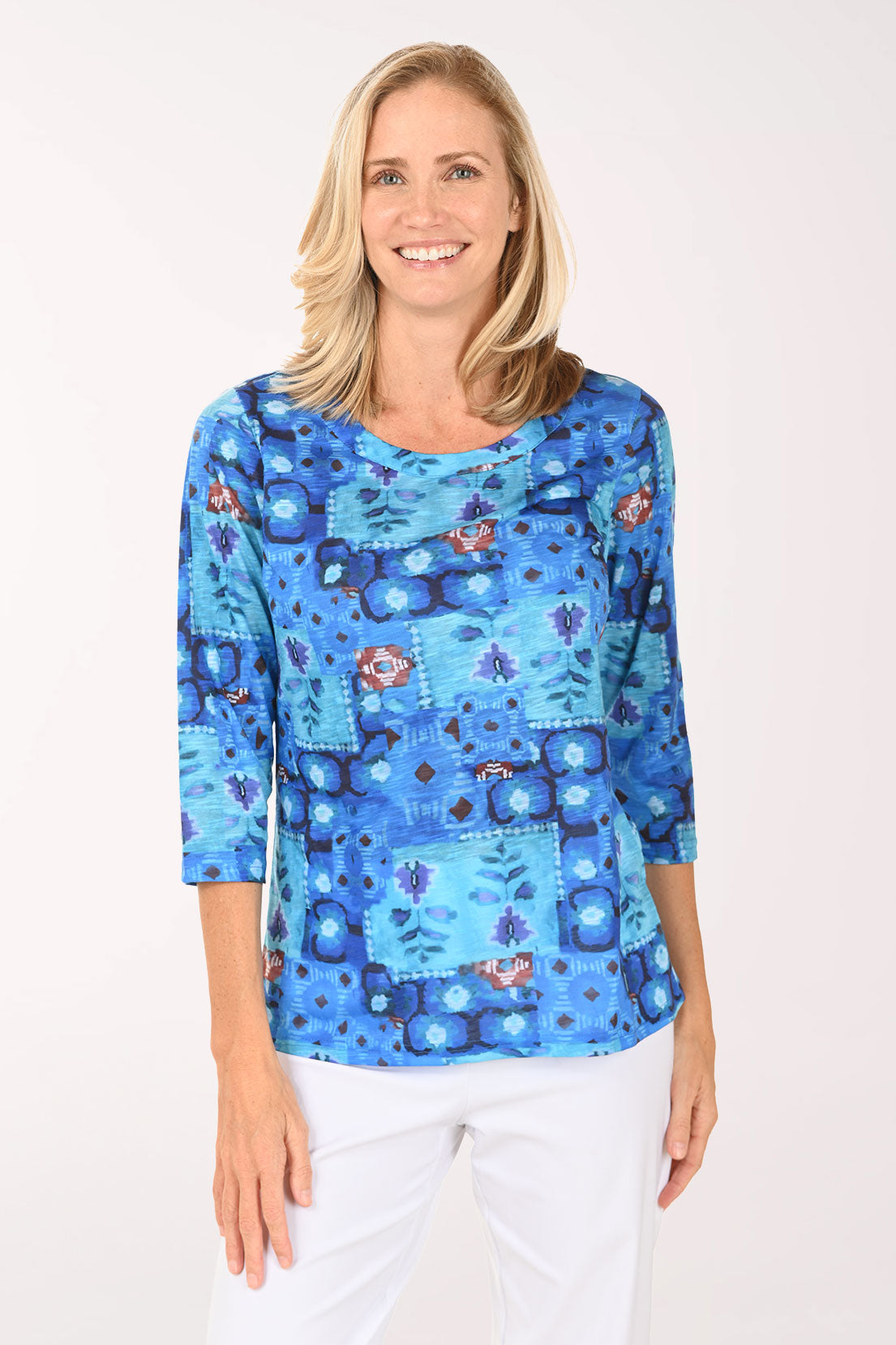 Woman wearing a 3/4 sleeve blue top