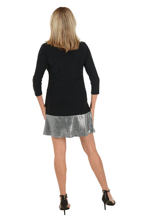 Back shot of a model wearing a 3/4 sleeve back dress with sequence at the bottom