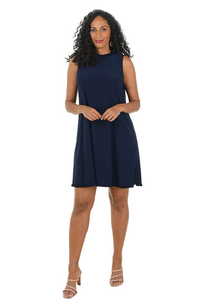 Woman wearing a navy blue dress on a white background