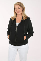 Woman wearing a black hoodie with a zipper on a white background