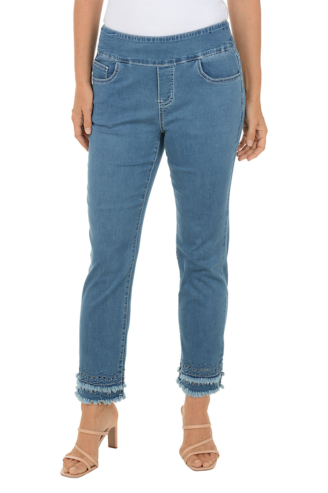 Blue jeans worn by a person on a white background.