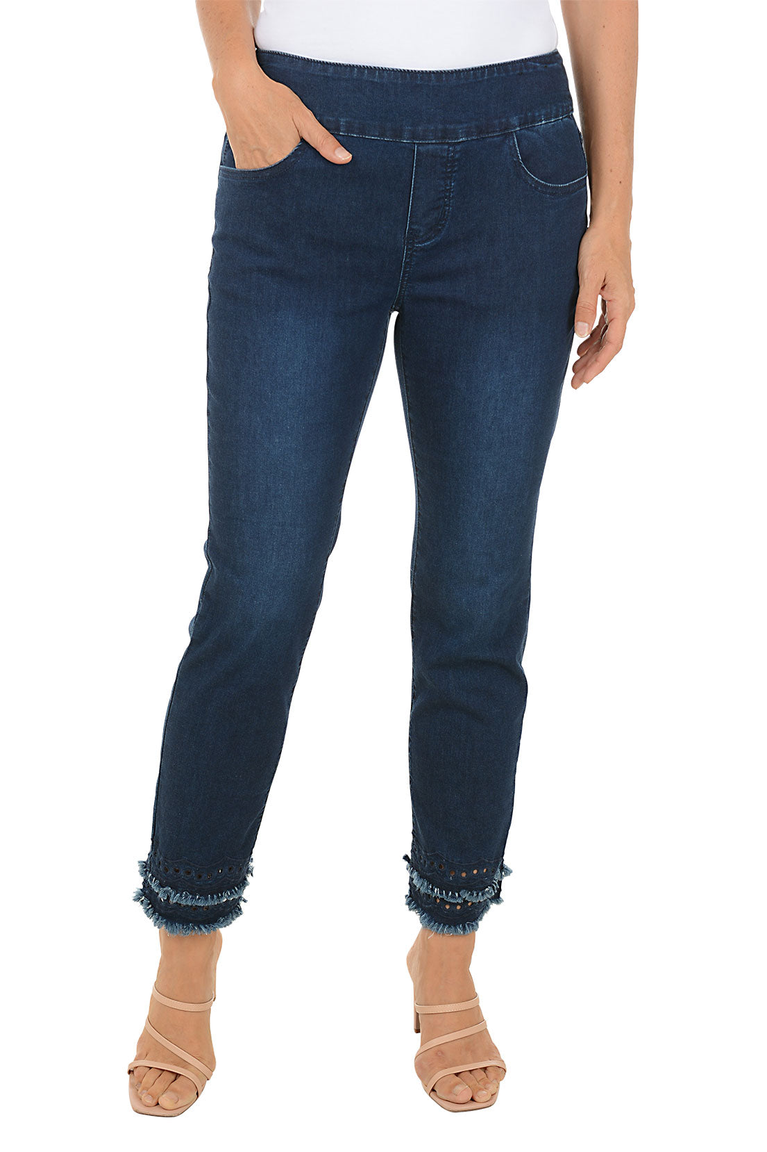 Person wearing dark blue jeans with a white background.