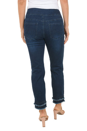 Person wearing dark blue jeans with a white background. Back shot.