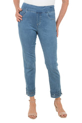 Light blue jeans worn by a person on a white background.