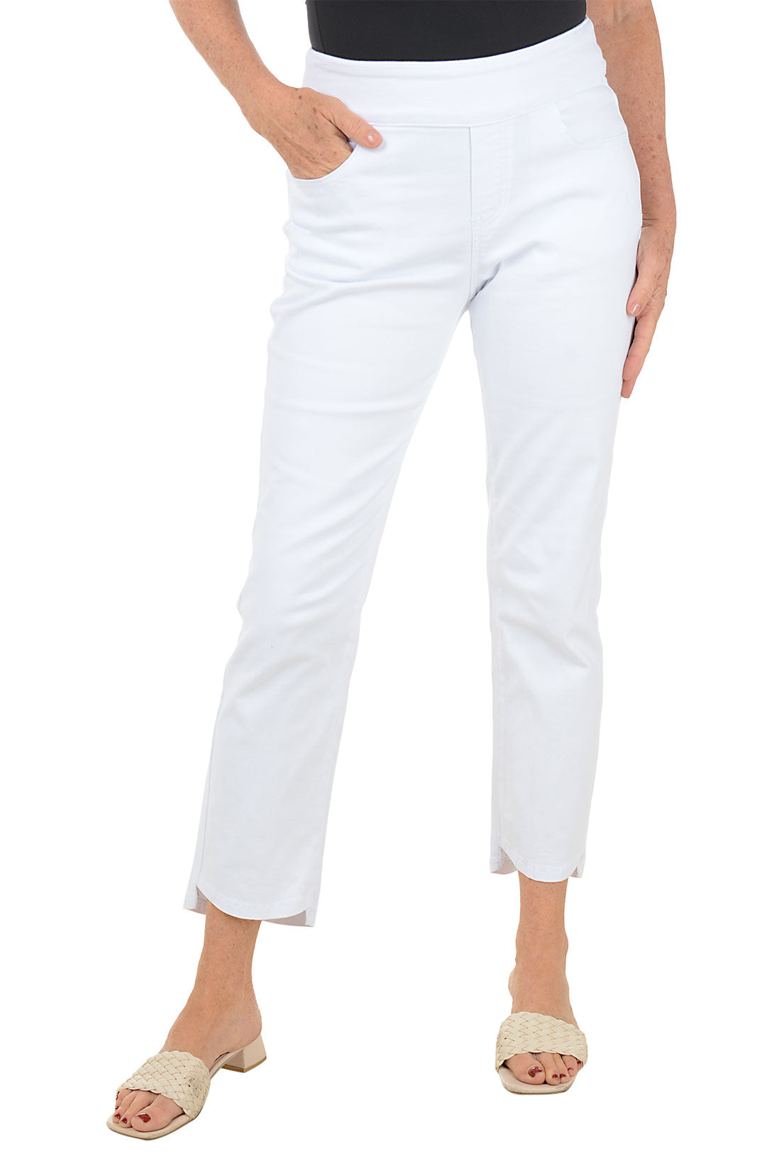 White pants worn by a person on a white background.