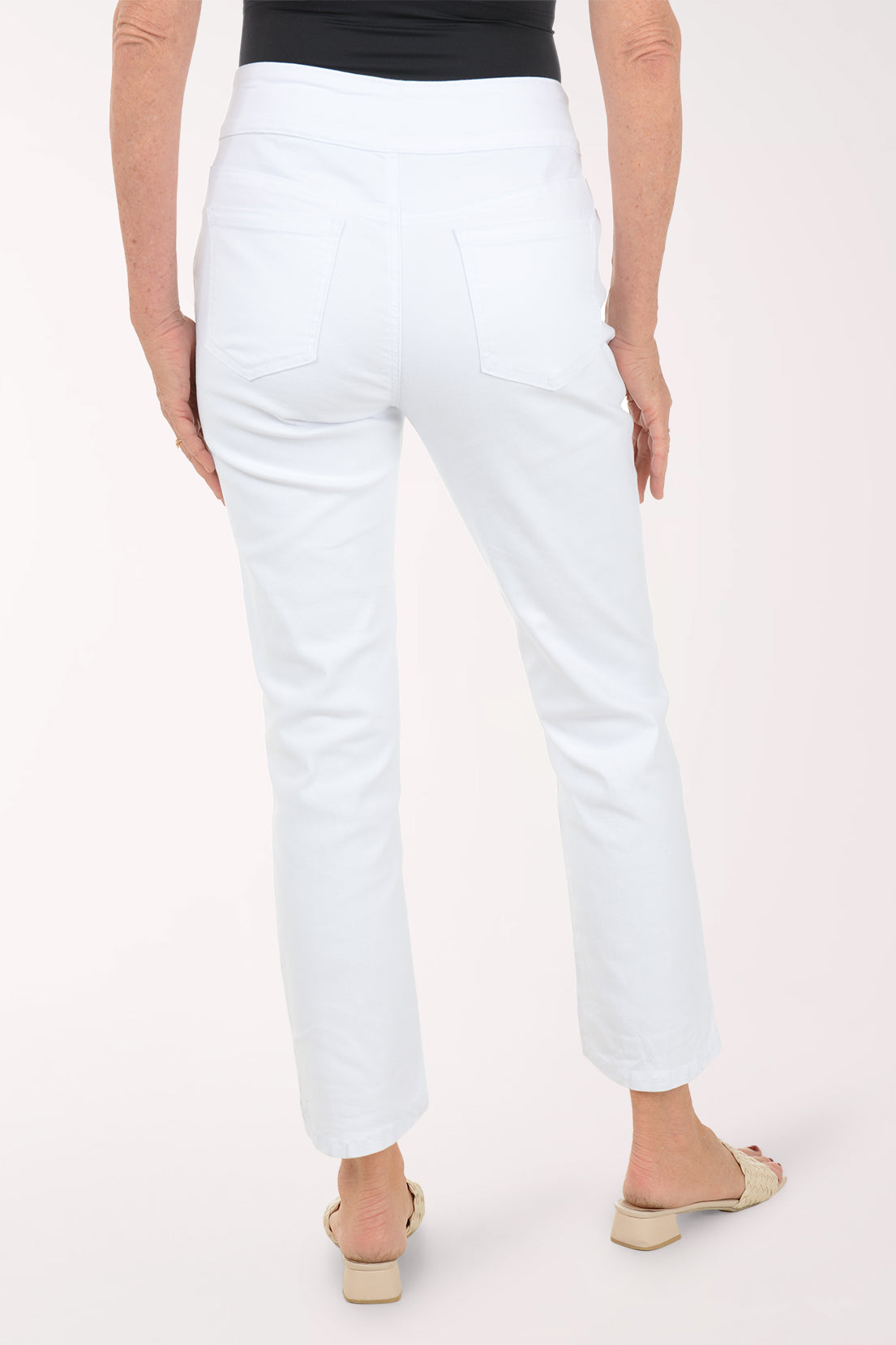 Back view of the White Denim Stepped Hem Ankle Pant showing the back pockets and ankle-length hem.