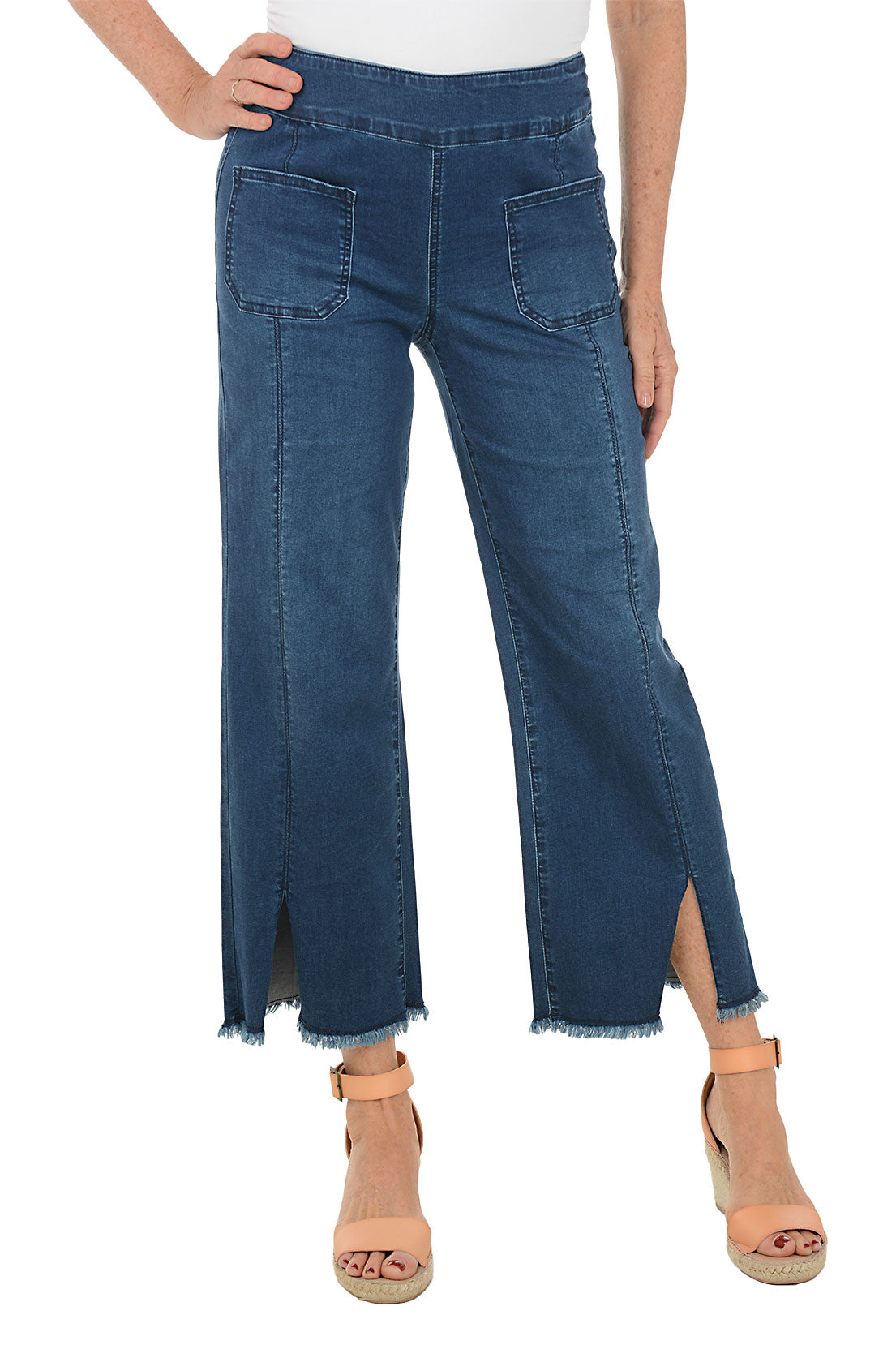 Blue jeans with a slit on a white background.