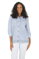 Woman wearing a blue and white striped shirt on a white background.