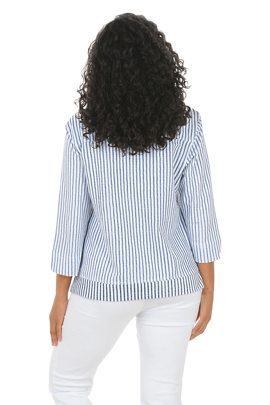 Woman wearing a blue and white striped shirt on a white background. Back shot.