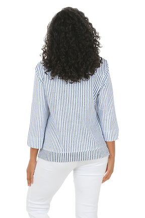 Woman wearing a blue and white striped shirt on a white background. Back shot.