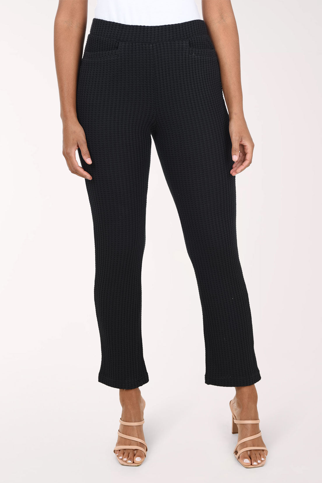 Woman wearing pull-on black cropped pants