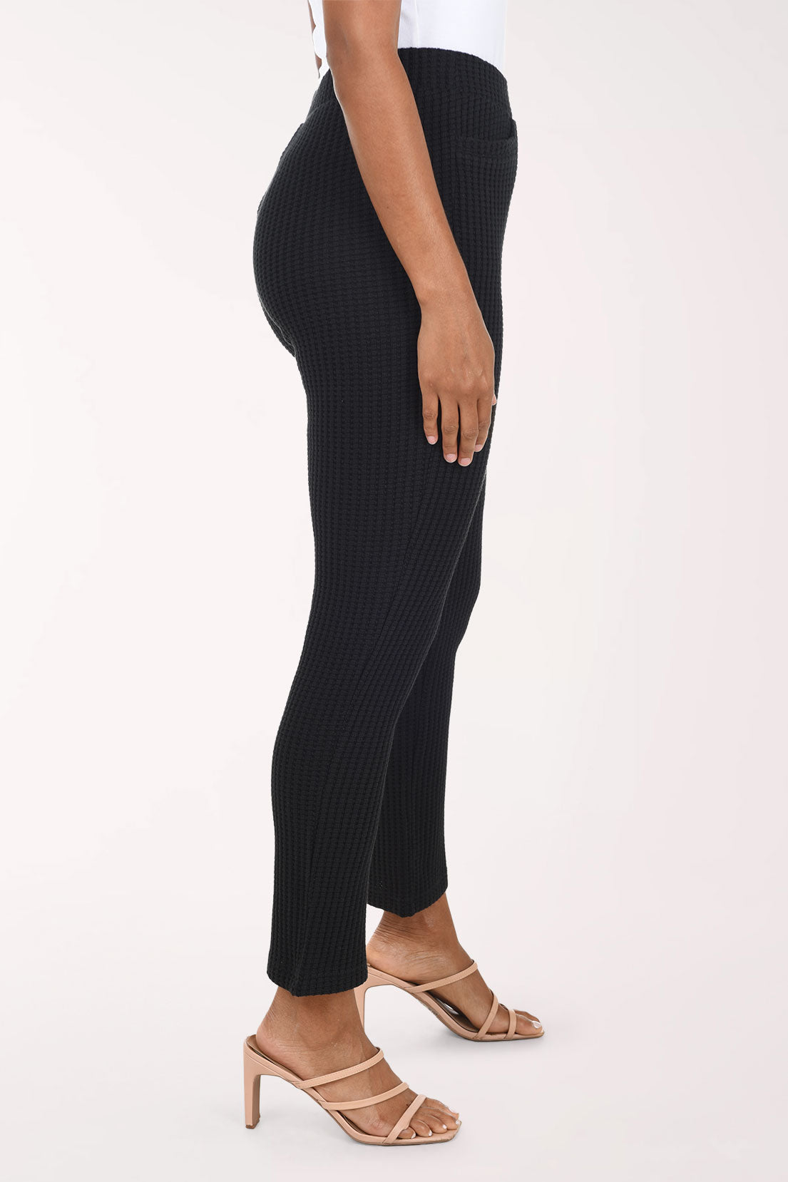 Woman wearing pull-on black cropped pants