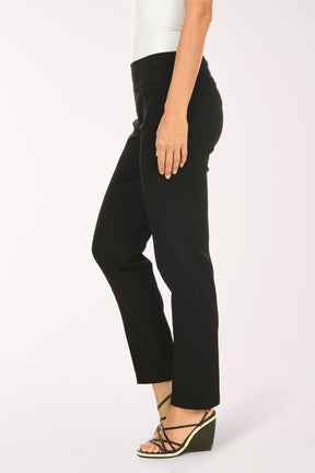 Person wearing black pants and a white top on a white background