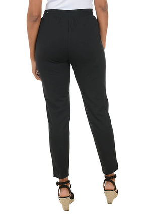 Black pants worn by a person on a white background. Back shot.