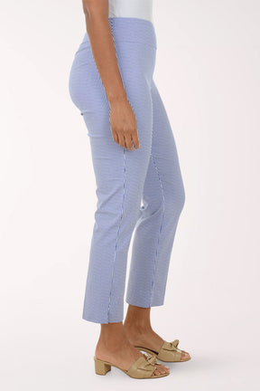 Person wearing blue striped pants on a white background