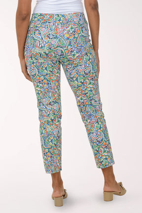Colorful patterned pants worn by a person on a white background