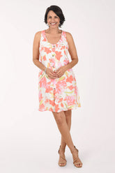 Woman wearing a floral dress on a white background