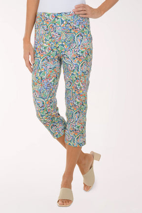 Colorful patterned pants worn by a person on a white background
