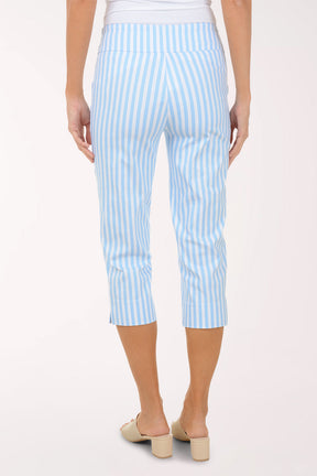 Person wearing light blue and white striped pants on a white background