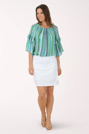 Woman wearing a green and blue striped blouse on a white background