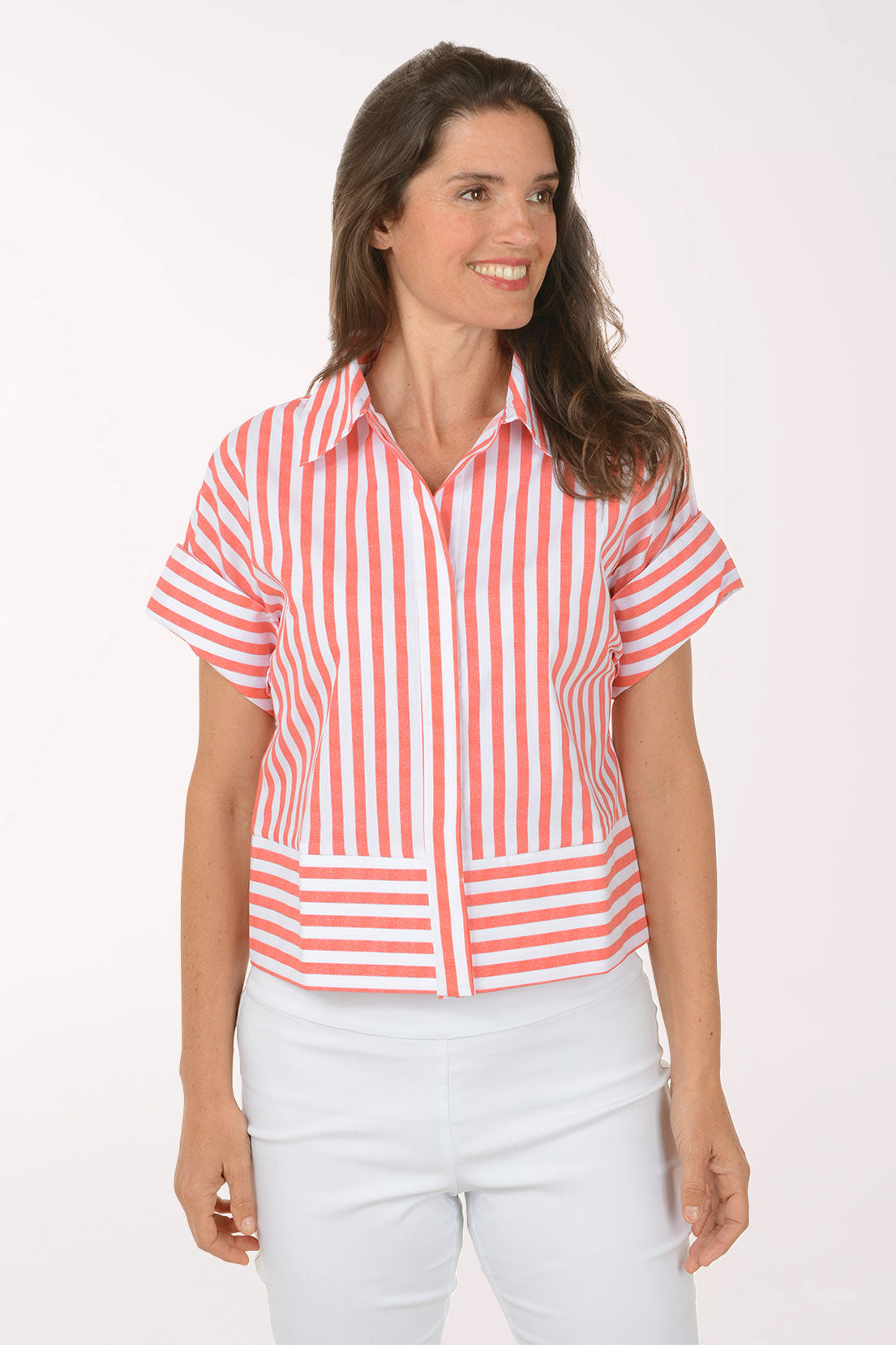 Woman wearing a red and white striped shirt with a white background