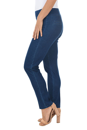 Side shot blue jeans worn by a person on a white background