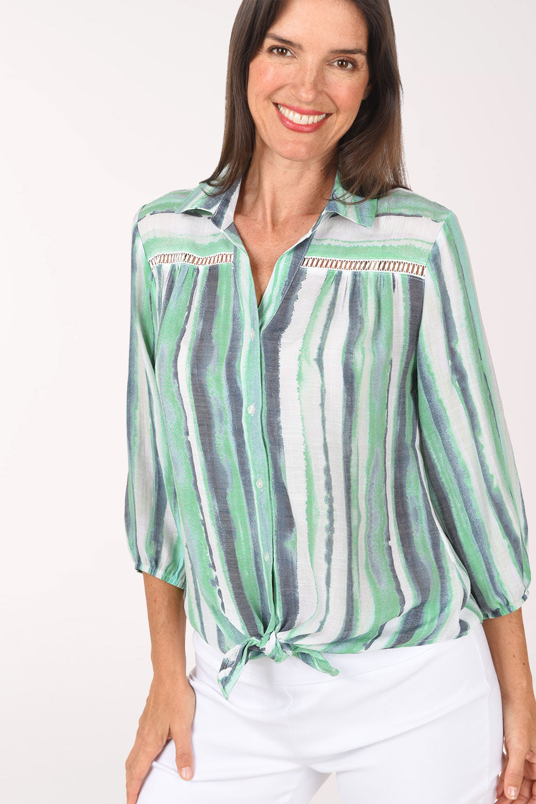 Close-up of the sheer crochet shoulders and fold-over collar on the Green Gulfstream Striped Crochet Detail Shirt