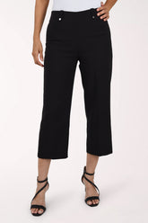 Woman wearing black pull on capri pants