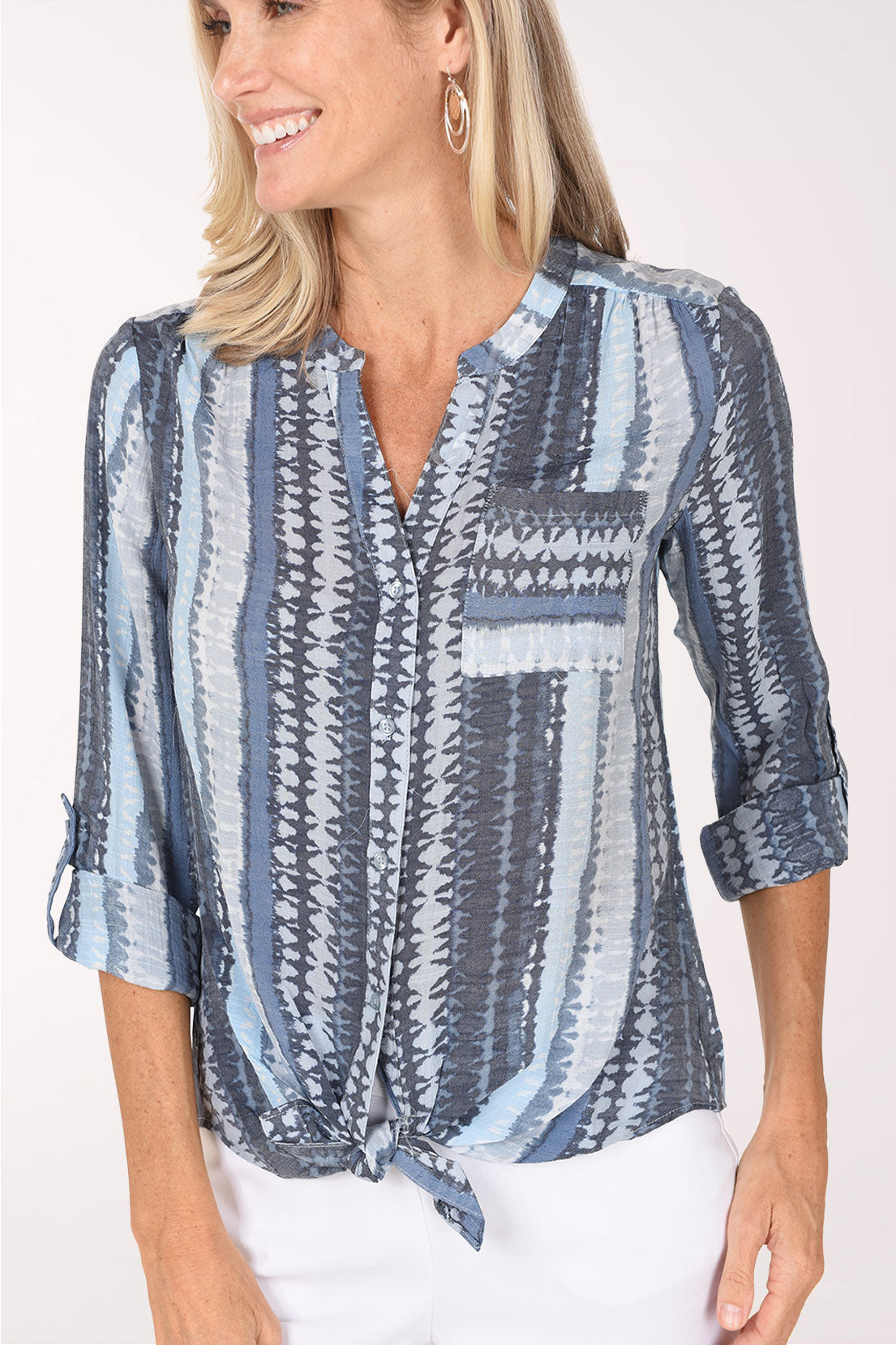 Close-up of the split V-neckline, mandarin collar and chest pocket on the Mottled Blue Striped Button-Front Blouse