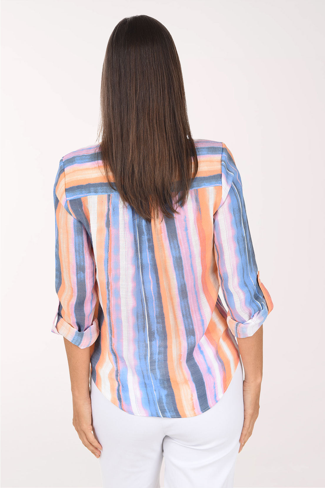 Back view of the Autumn Sunset Striped Button-Front Blouse showing the center back pleat and longer back hem