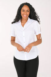 Woman wearing a white short-sleeve shirt and black pants on a white background