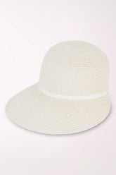 White straw hat with a white band on a white background