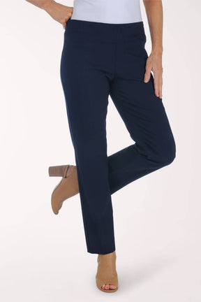 Navy blue pants worn by a person on a white background