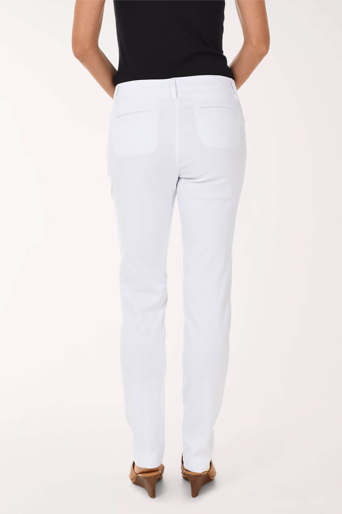 Person wearing white pants on a white background