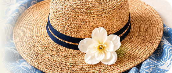 Sun hat with a white flower